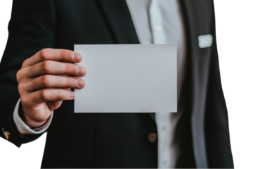 Man in suit holding a blank white card isolated on a transparent background