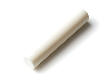 Smooth, cylindrical object resting on a light surface, casting a soft shadow, suggesting minimalism