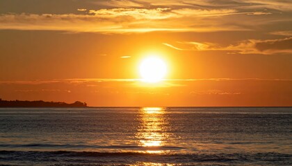 Fototapeta premium Sunset Over Calm Ocean Signifying Environmental Changes and Challenges