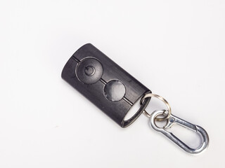 Black key fob with a carabiner clip isolated on a white background