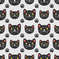 Cute black kitten hand drawn, seamless vector design for print on fabric and other uses.