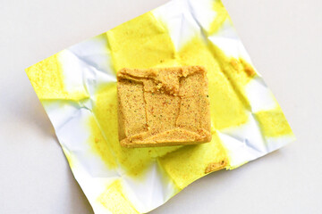 Chicken stock cube. Cooking preparation concept.