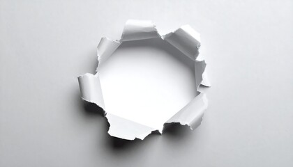 Torn Paper Hole in White Background