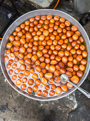 A large pot of Gulab jamun in Jaipur, India