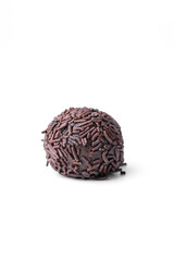 Obraz premium Handmade round chocolate truffles coated with fine chocolate shavings, arranged in neat pile on white background