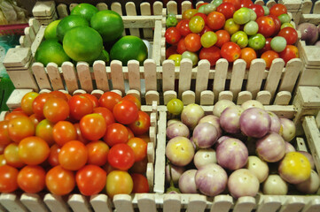 Fruits and vegetables in basket seasoning for cooking Papaya Salad or Som Tum tradition thai and lao food in local shop at Louangphabang Street Night Bazaar Market in Luang Prabang, Laos