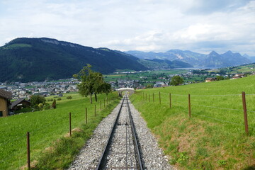 mountain landscape with a wooden fence