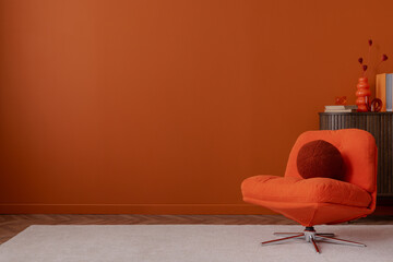 Mid-century modern interior with an orange accent wall, retro swivel chair, and sculptural decor. Warm tones and clean lines create a cozy minimalist scene.