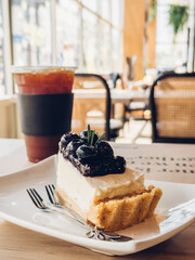 Blueberry cheesecake with cold brew coffee at cafe