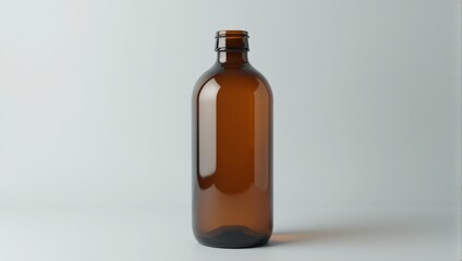 Brown glass bottle on white background