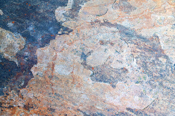 Close-up of weathered rock surface with layers.Textured mineral surface for nature-related visuals.