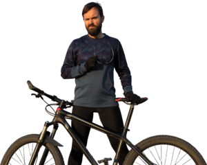 Cyclist in shorts and jersey on a modern carbon hardtail bike with an air suspension fork standing on a cliff against the background of fresh green spring forest