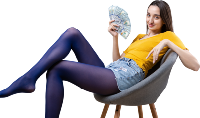 Photo of a wealthy woman in simple clothes holding a fan of dollar money isolated against a concrete wall background