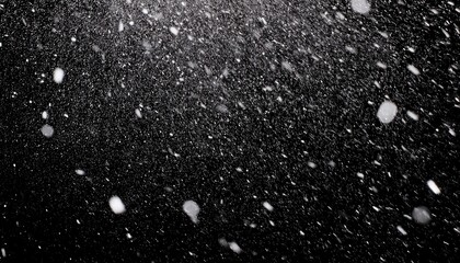 falling snow isolated on pure black background