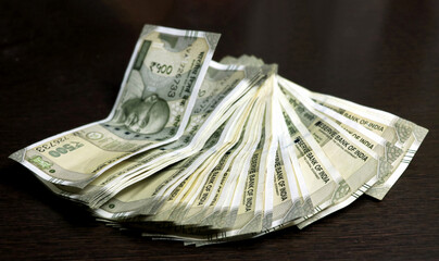 Indian Rupees 500 currency notes on the wooden table