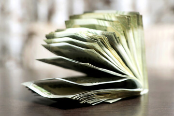 Indian Rupees 500 currency notes on the wooden table