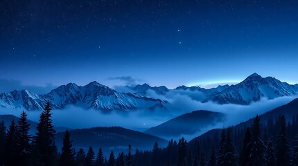 Night scene of snowy mountains under a starry sky with a forest in the foreground and low lying clouds