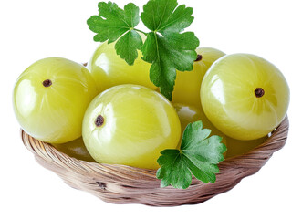 indian gooseberries (amla) in a basket, isolated on black.