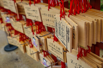 Wooden tablets with prayers near the Japanese temple