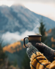 cup of hot tea in the mountains