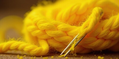 Close-up of vibrant yellow knitting wool and needle  , handmade, thread, yellow