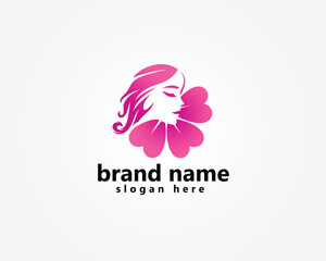 sakura flower logo, creative cherry blossom with silhouette of beautiful woman's head with loose hair, logo design inspiration © panen arto