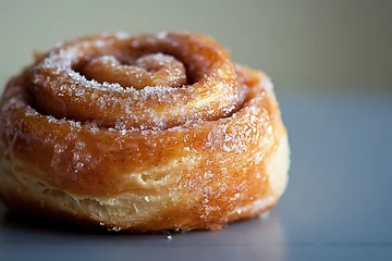 Sweet frosted cinnamon roll closeup