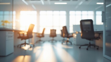 Gently blurred office space with sunlight streaming in through the window