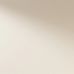 Fototapeta premium A plain beige surface with a slight shadow gradient