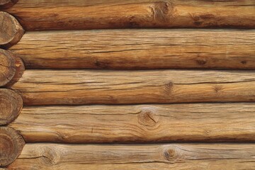 Obraz premium sustainable building materials,Close-up of horizontal wooden logs with visible grain, knots, and natural texture, stacked to form a rustic surface.