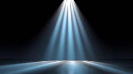 A bright blue spotlight illuminates a dark empty stage with a smooth floor, creating a dramatic and focused atmosphere perfect for performance or presentation.