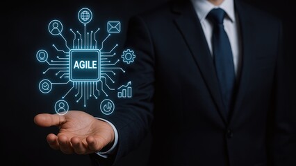 Businessman showcasing agile technology concepts with digital interface elements.