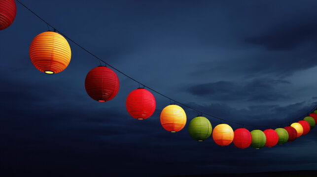 A st of vibrant and colorful paper lanterns illuminates the dark, overcast sky, creating a festive and whical atmosphere perfect for an outdoor celebration. - Powered by Adobe