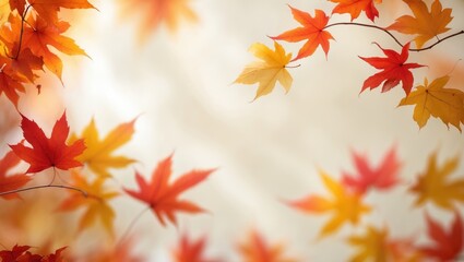 Obraz premium Softly blurred autumn leaves against a light background