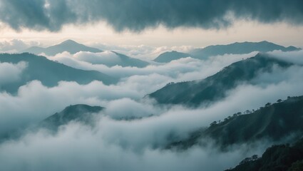 Cloud-covered mountain view at dawn with fog and rain in Thailand's wilderness