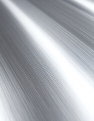 Smooth, reflective surface of brushed aluminum showcasing sleek lines and metallic sheen, emphasizing modernity and industrial aesthetics