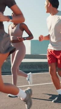 City, group and friends for fitness, wellness challenge and training for marathon on bridge. Women, man and running people with endurance for exercise, cardio and morning jog on road with workout