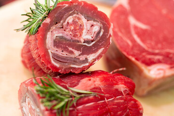 Meat rolls. Raw pork rolls stuffed with ham and cheese seasoned with rosemary. Pork loin. Semi-finished raw product