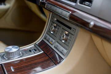Automatic transmission selector in the interior of a modern car.