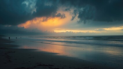 Fototapeta premium Misty beach sunrise following rain, showcasing the stunning golden hour