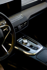Selector automatic transmission with leather in the interior of a modern car.