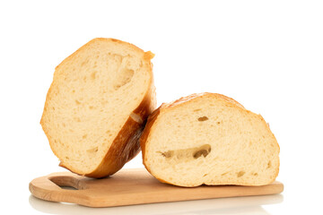 One wheat bun, close-up, isolated on a white background.