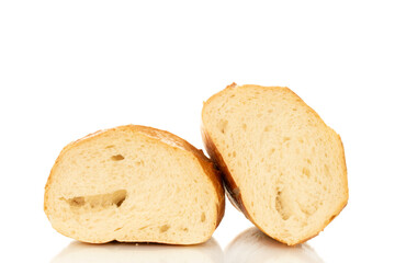 One wheat bun, close-up, isolated on a white background.