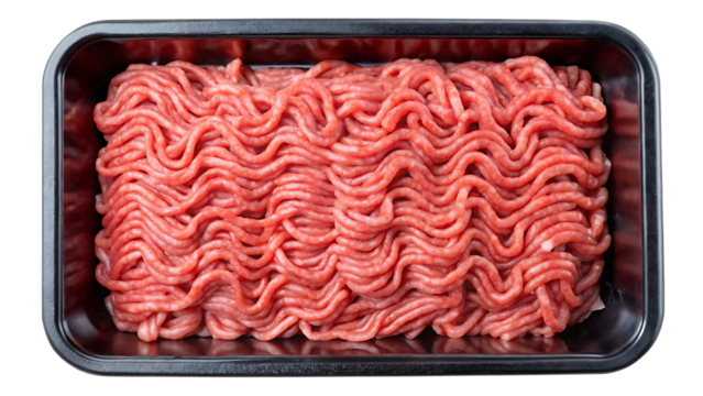 Raw minced meat in a black plastic tray container isolated on transparent background PNG