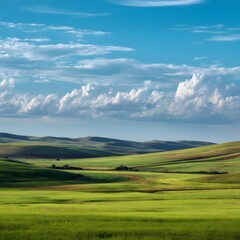 Obraz premium Lush Green Hills Under Blue Sky With Soft White Clouds