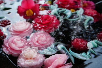Colorful Camellia Flower floating on Water, Image of Japanese - 花手水 水に浮いた椿の花 
