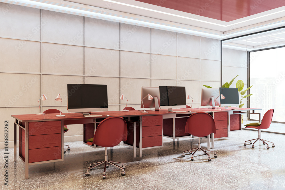 Aufkleber modern open-plan office interior with red furniture, computers on desks, and large windows in contem
