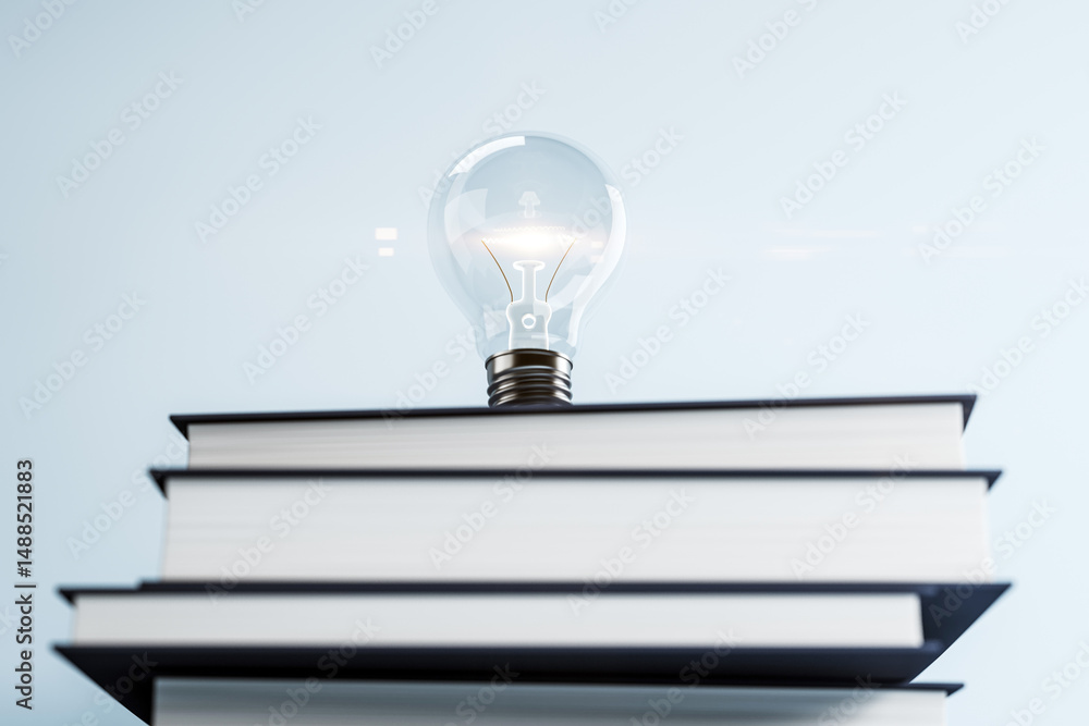 Poster lightbulb on stacked books symbolizing idea, learning, and innovation in education and technology on