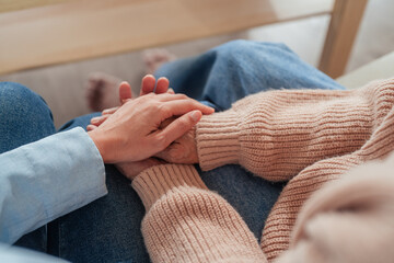Asian family Cut out of mother holding daughter's hand Hold on tight and never let go Happy...