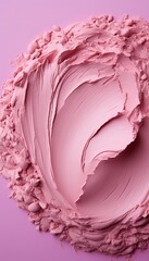 Obraz premium Lipstick or creamy bluster smudge swatch isolated on pink background